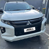 White mitsubishi triton 2019-2023 with black grille and roof rack featuring headlight and taillight covers