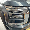 Sleek matte headlight cover for mitsubishi triton 2024+ with sharp chrome accents and intricate led lighting details