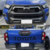 Blue toyota hilux 2021-2025 sr5 with black front grille and rear bed cover showing headlight and taillight covers