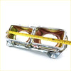 Chrome finished dual-headlight housing with polished metal and mounting brackets for nissan datsun 720 king cab 79-86