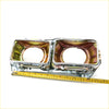 Chrome finished dual headlight housing with reflective slightly tarnished interior and mounting hardware for nissan datsun 720 king cab 1979-1986