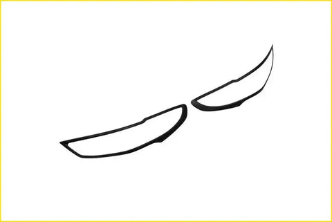 Black plastic headlight trim covers for bt50 2021 designed to surround and protect car headlights