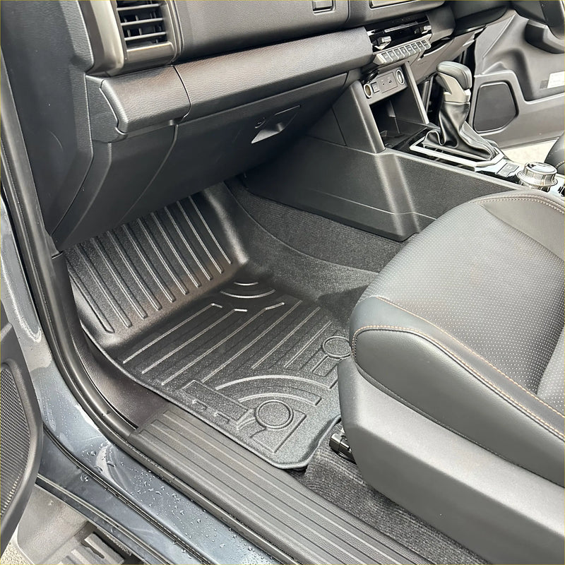 Black rubber heavy duty mat with ribbed texture and molded contours for snug fit fit for mitsubishi triton 2024+