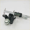 Black metal idler arm support with shiny silver hitch ball measured by digital caliper for toyota hilux 1988-1997
