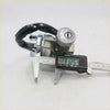 Black and silver ignition cylinder switch with keyhole mounted on metal bracket for Mazda B1600 B1800 1982-1984