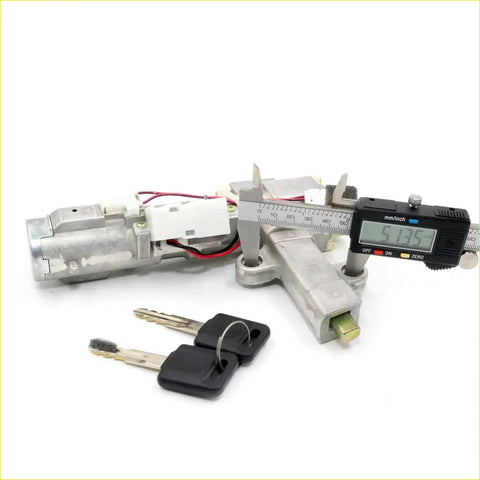 Silver metal car door lock cylinder with black key fobs and red wiring for ignition switch steering lock nissan altima