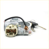 Silver metal ignition switch with beige plastic housing and black wiring with keys for nissan pulsar sunny sentra 2000-2005