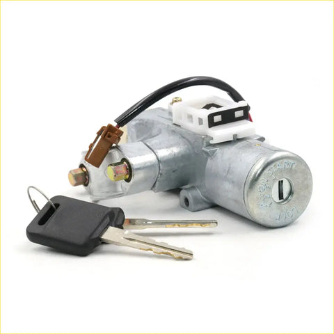 Silver ignition switch steering lock for Nissan Terrano Regulus JLUR50 with black key and matching keys nearby