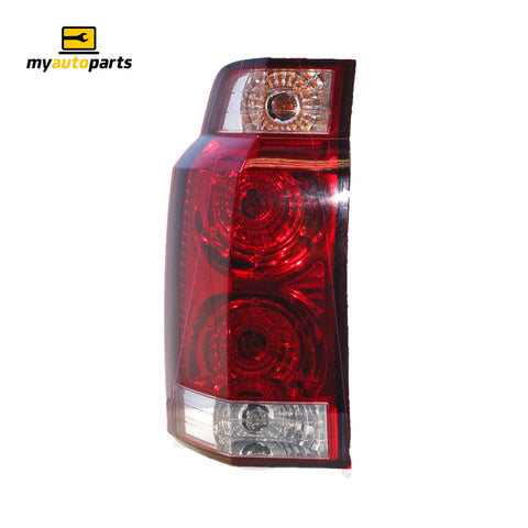 APG All Crash Red/Clear Tail Lamp Passenger Side OEM