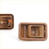 Brown plastic inner door handle with integrated latch mechanism for mazda b series 1985-1998 shown from back side
