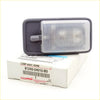 Gray plastic interior dome light for Toyota Hilux 1997-2005 with clear textured lens and on off switch