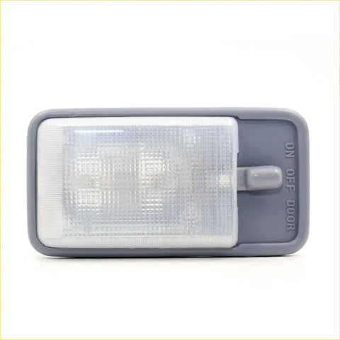 Gray plastic interior dome light for toyota hilux 1997-2005 with clear textured lens and built-in on off switch