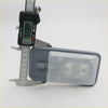 Gray rectangular interior dome light with clear textured lens for Toyota Hilux Surf 1997-2005 trunk view