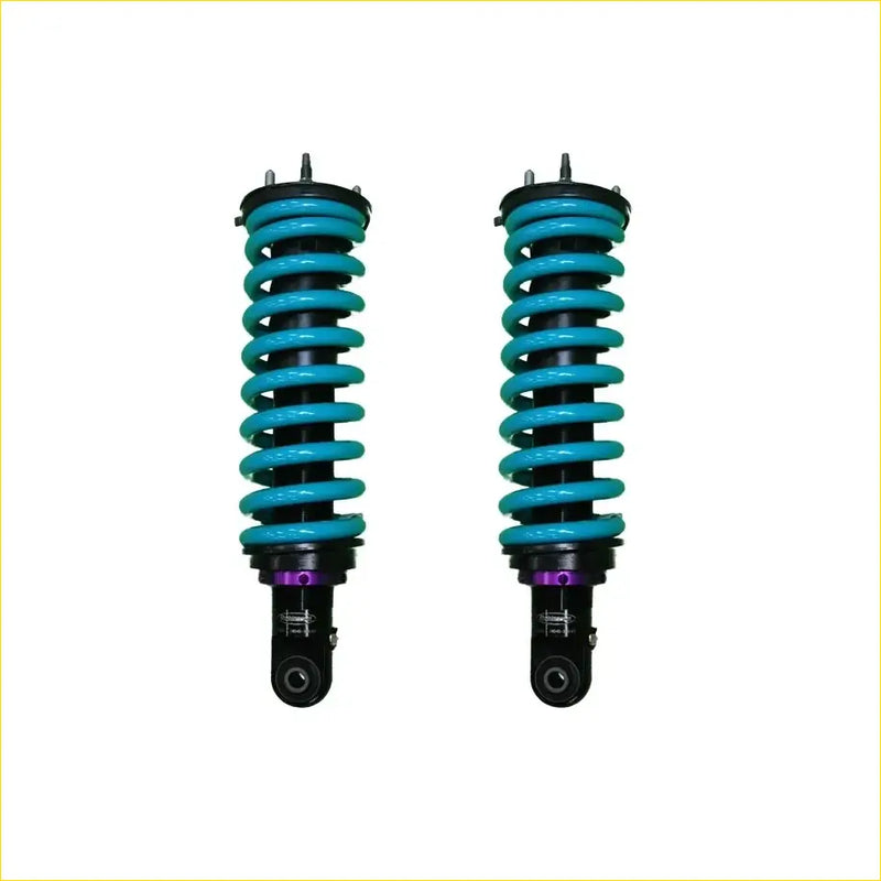 A pair of dobinsons ims monotube front lift shock absorbers for isuzu mu x ucs40 with teal coils and black bodies