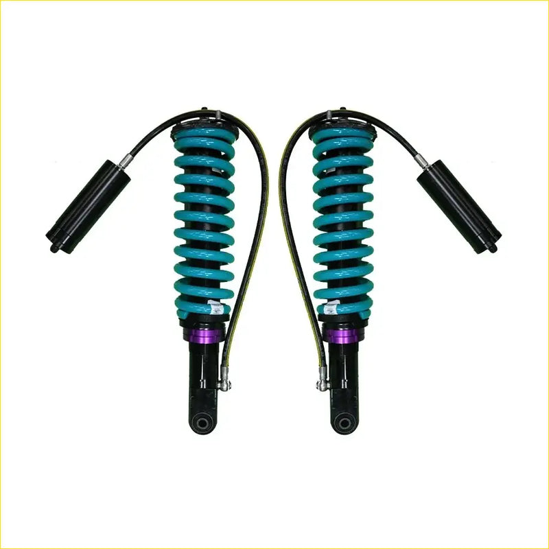 A pair of teal-coiled dobinsons monotube remote reservoir suspension shocks with black and purple accents for isuzu mu-x ucs40