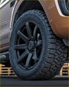 Black matte alloy wheel with aggressive tread pattern and kumha branding on the sidewall for kenda klever at2 265 65 r18