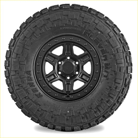 Black kenda klever mt2 265/70 r17 tire mounted on black alloy wheel for rugged off-road use