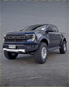 Black ford ranger raptor with rugged off-road kenda klever mt2 315/75 r16 tires and bold front grille