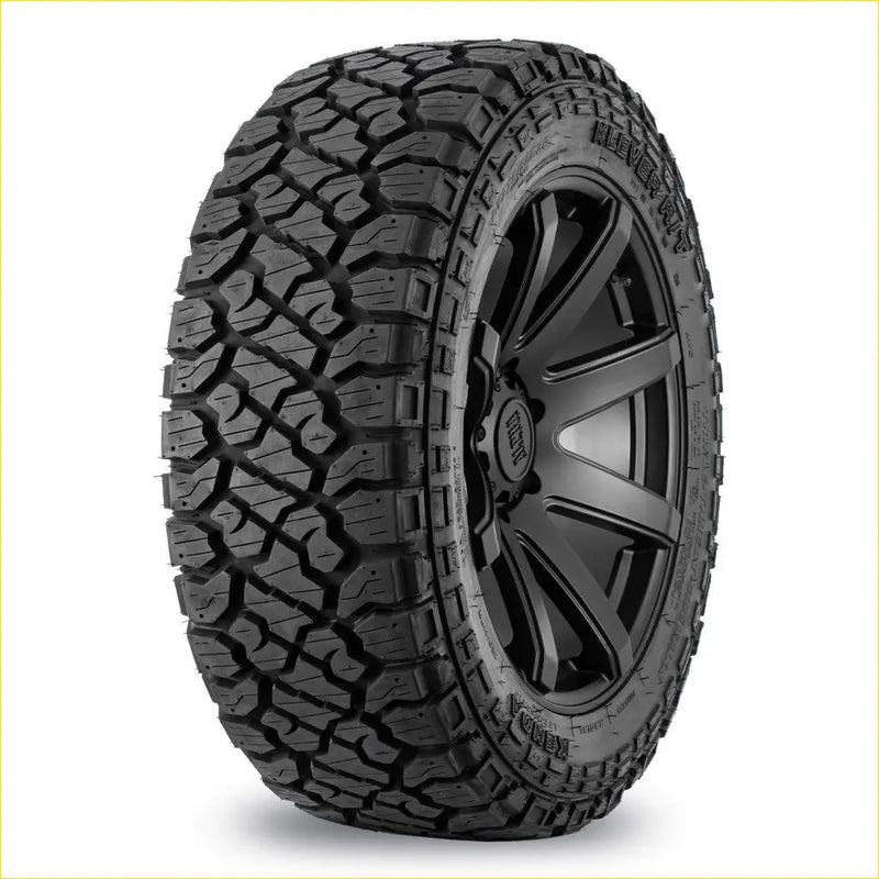 Black rubber off-road kenda klever rt tire with aggressive tread pattern on black alloy wheel 285 65 r18