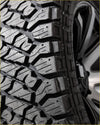 Black rubber kenda klever rt 33x12.5 r20 off-road tire with aggressive tread pattern and deep grooves for tough terrain