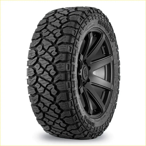 Black rubber off-road kenda klever rt tire with aggressive tread mounted on black alloy wheel for rugged use