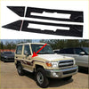 Black textured grille guard kit for toyota land cruiser with emblem trim designed for durable front protection