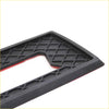 Black rubber landcruiser emblem trim car floor mat with diamond pattern and red adhesive backing shown from back side