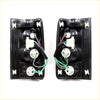Black plastic led smoke tail light assemblies with white bulb housings and colored wiring for toyota hilux ute backside