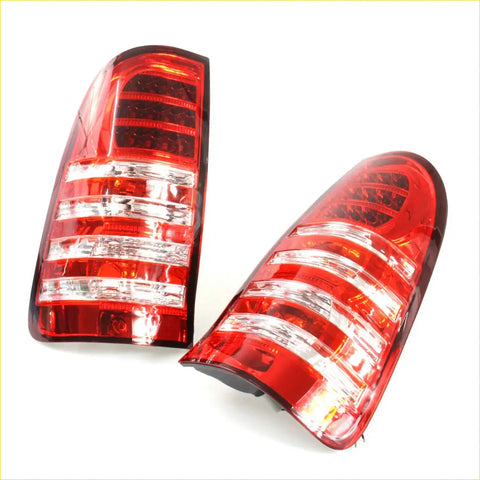 Red led tail light x2 for Toyota Hilux SR5 2004-2016 with clear lens sections and sleek curved design back side view