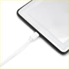 White usb-c charging cable connected to black-framed tablet showing the LED visor mirror in use