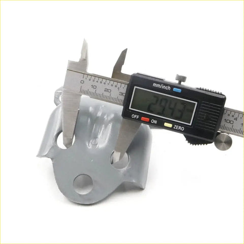 Gray metallic skull-shaped left door hinge bracket for mitsubishi triton l200 1986-1996 measured with caliper