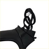 Black coiled cable with white connector attached to black plastic housing for left door mirror mazda cx-5 2017+ blind spot