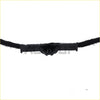 Black plastic connector with circular center attached to black fabric cord on back side of left driver side mirror for ram 1500 classic 2500 2013 2018