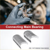 Used rusted main bearing held in gloved hand with new silver metallic bearings below for toyota tundra kit