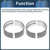 Two silver metallic split crankshaft bearing journals with engraved markings from main bearing set for toyota starlet