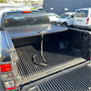 Black metal truck bed liner with ribbed texture and integrated locking for manual roller shutter tonneau cover ford ranger px1 px2 px3