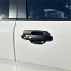 Matte black door bowl insert with integrated keyhole and button on white ford ranger 2022 door handle
