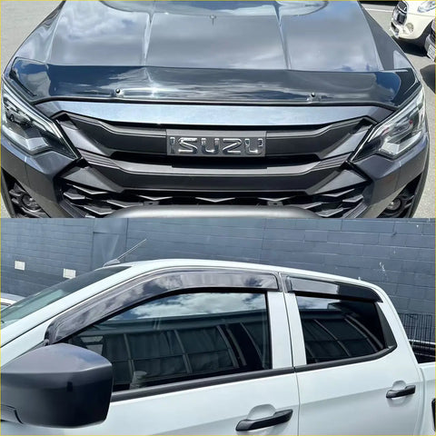 Black matte finish isuzu d-max 2024 pickup truck with sleek angular front grille and black side window visors monsoon bonnet guard