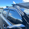 Black plastic roof rack with integrated led light bar on dark suv for monsoon and bonnet guard ldv t90 2022+