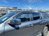 Dark gray metallic mitsubishi triton 2024 monsoon and bonnet guard with chrome mirrors and black roof rack