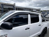 Black plastic side window visors on white toyota hilux 2005-2012 with monsoon and bonnet guard accessories
