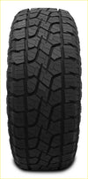 Black rubber monsta terrain gripper at tire with deep aggressive tread pattern for off-road grip in size 265 70 r17