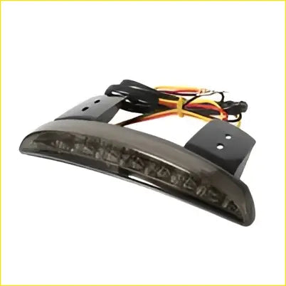Back side of black smoked led motorcycle rear fender edge brake license stop tail light with wiring and brackets