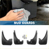 Black plastic mud flap splash guards with a sleek curved design for Toyota RAV4 2006-2012 vehicle protection
