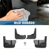 Black plastic mud flap splash guards with matte finish installed on a toyota sienna 2004-2010 from aftermarket kit