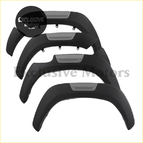 Black plastic mudguard fender flares with gray accent panels for toyota hilux wheel arches 2015-2024