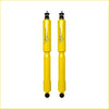 Pair of bright yellow dobinsons twin tube nitro gas shock absorbers with black caps for nissan navara d21 d22