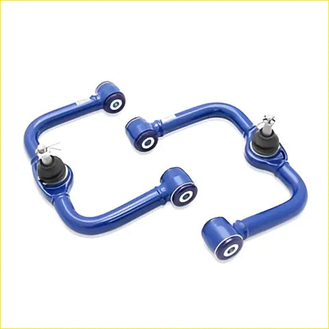 Blue performance suspension control arms with black rubber bushings and silver ball joints for nissan pathfinder r51 diesel