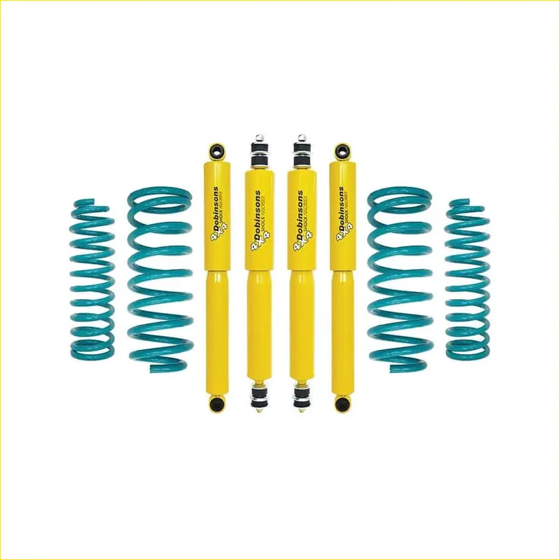 Set of four bright yellow dobinsons twin tube shock absorbers with teal coil springs for nissan patrol y60 gq ute