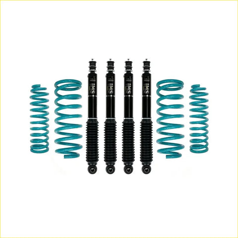 Set of four black sus shock absorbers with teal coil springs for nissan patrol y60 gq y61 gu suspension upgrade